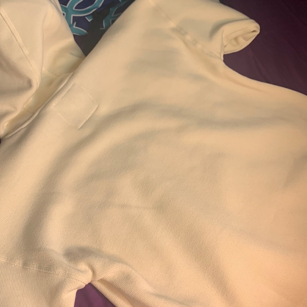 Selling a tan DKNY SWEAT SHIRT